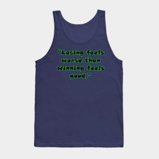 “Losing feels worse than winning feels good.” Tank Top